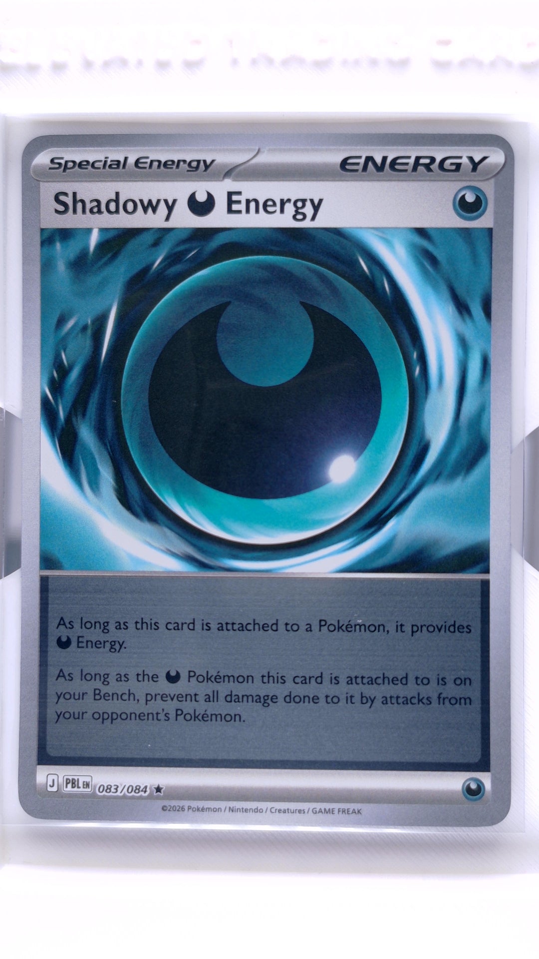 #83 Shadowy Energy Reverse Holo Rare - front