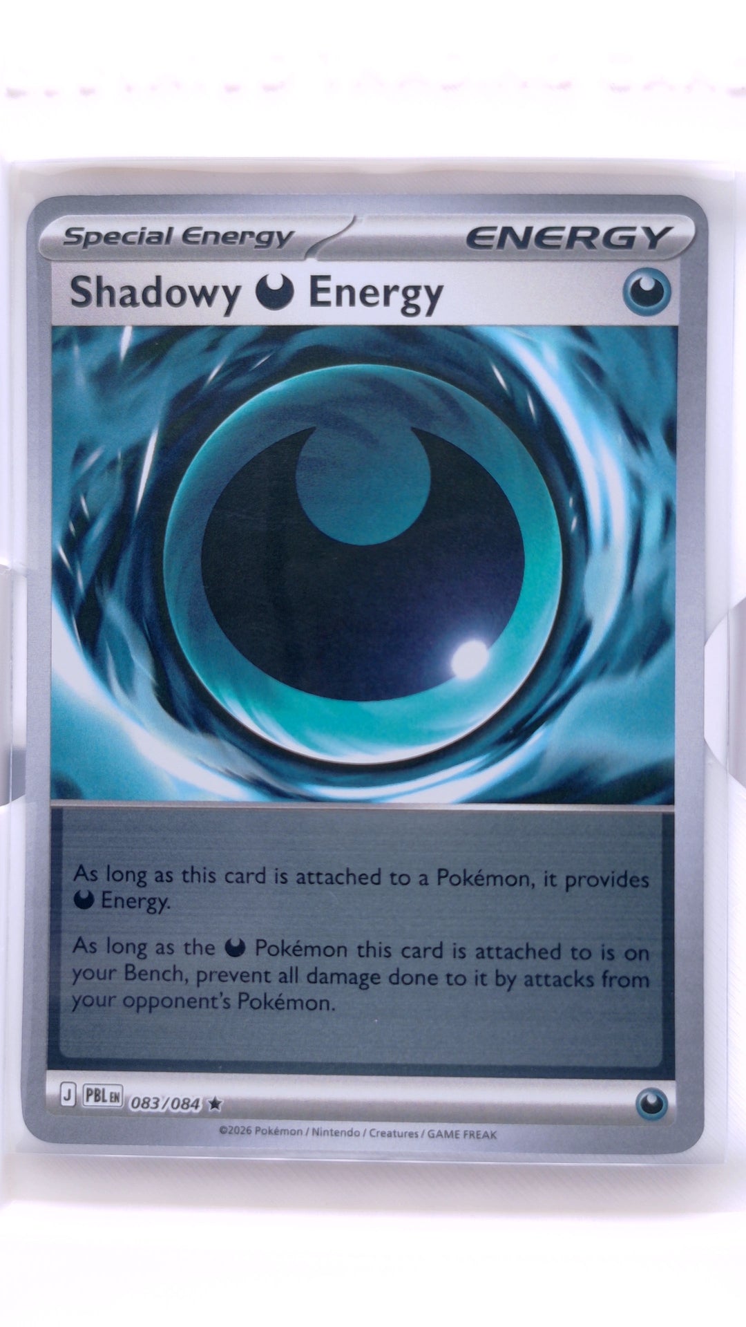 #083 Shadowy Energy Reverse Holo Rare - front