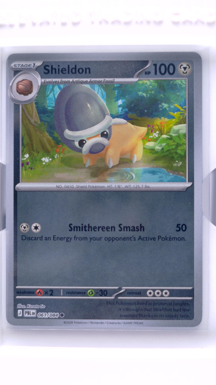 Pokémon TCG: Mega Evolution — Pitch Black Shieldon #061/084 Common Reverse Holo — Front