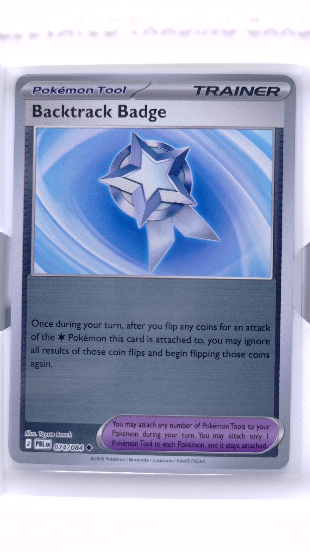 #74 Backtrack Badge Reverse Holo Uncommon - front