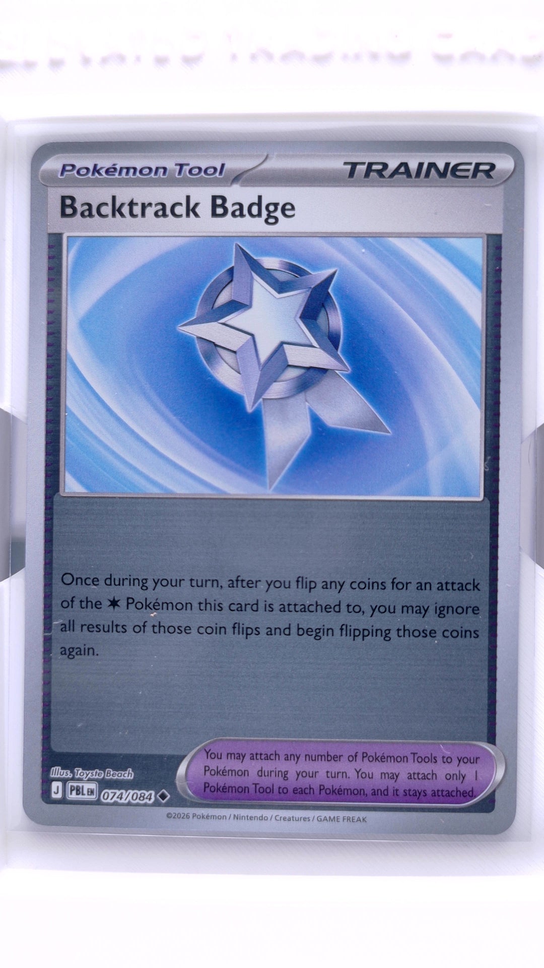 #74 Backtrack Badge Reverse Holo Uncommon - front
