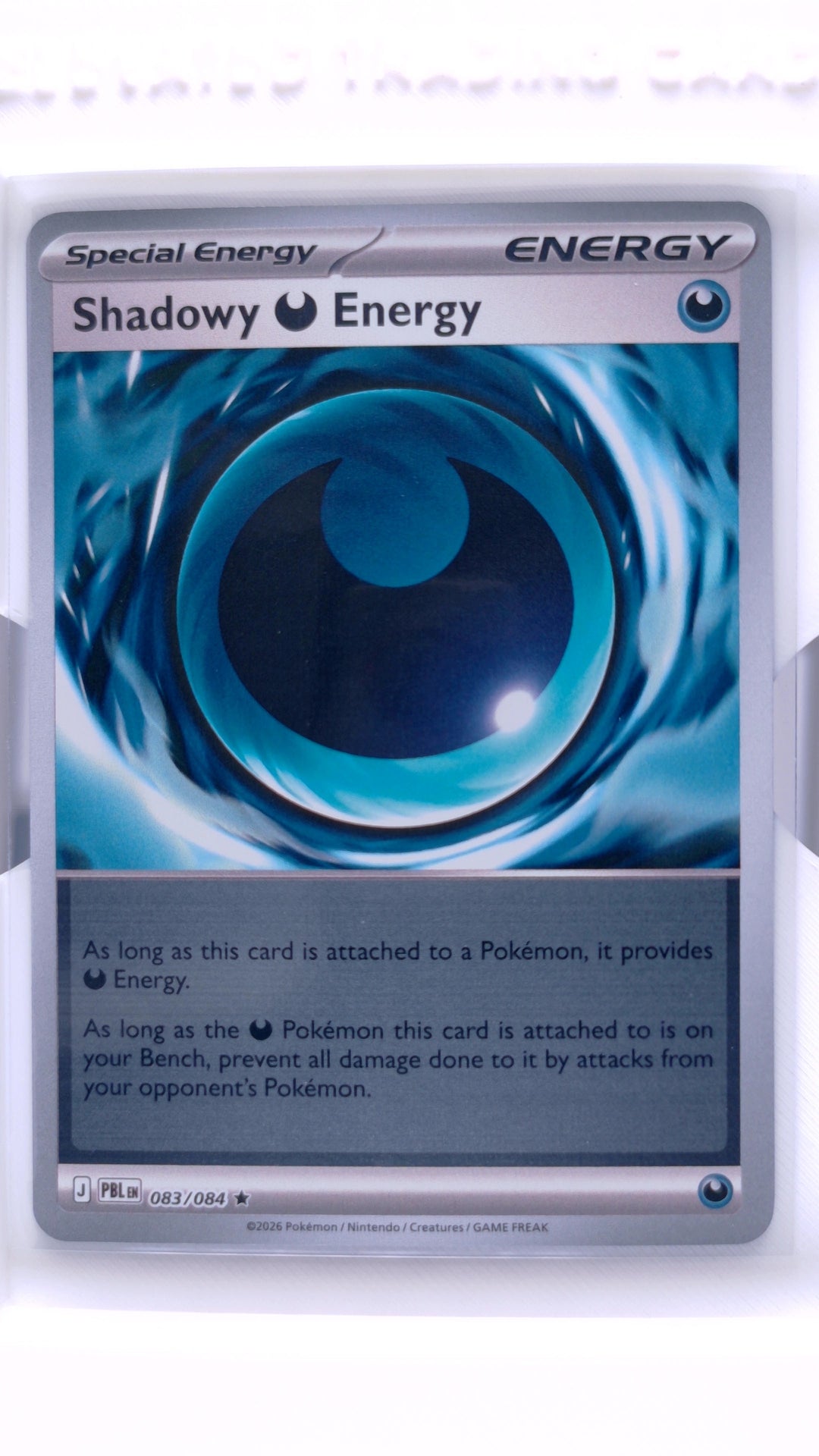 #83 Shadowy Darkness Energy Reverse Holo Rare - front