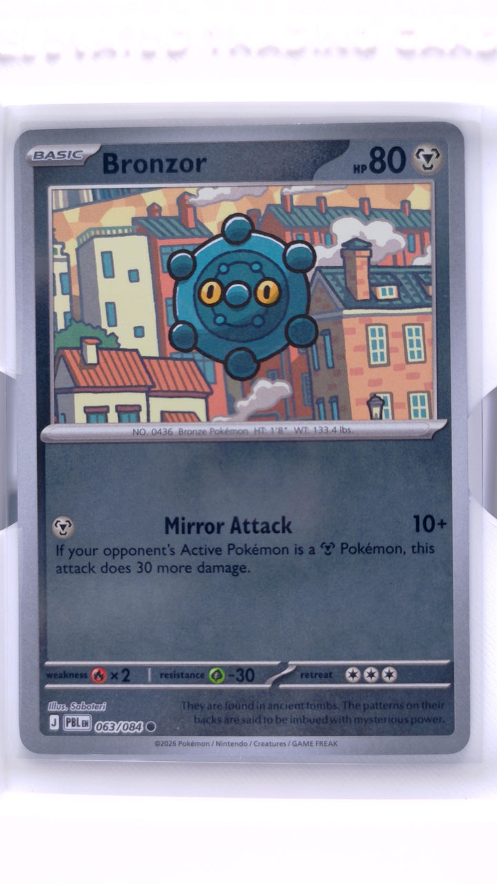 Pokémon TCG: Mega Evolution — Pitch Black Bronzor #063/084 Common Reverse Holo — Front